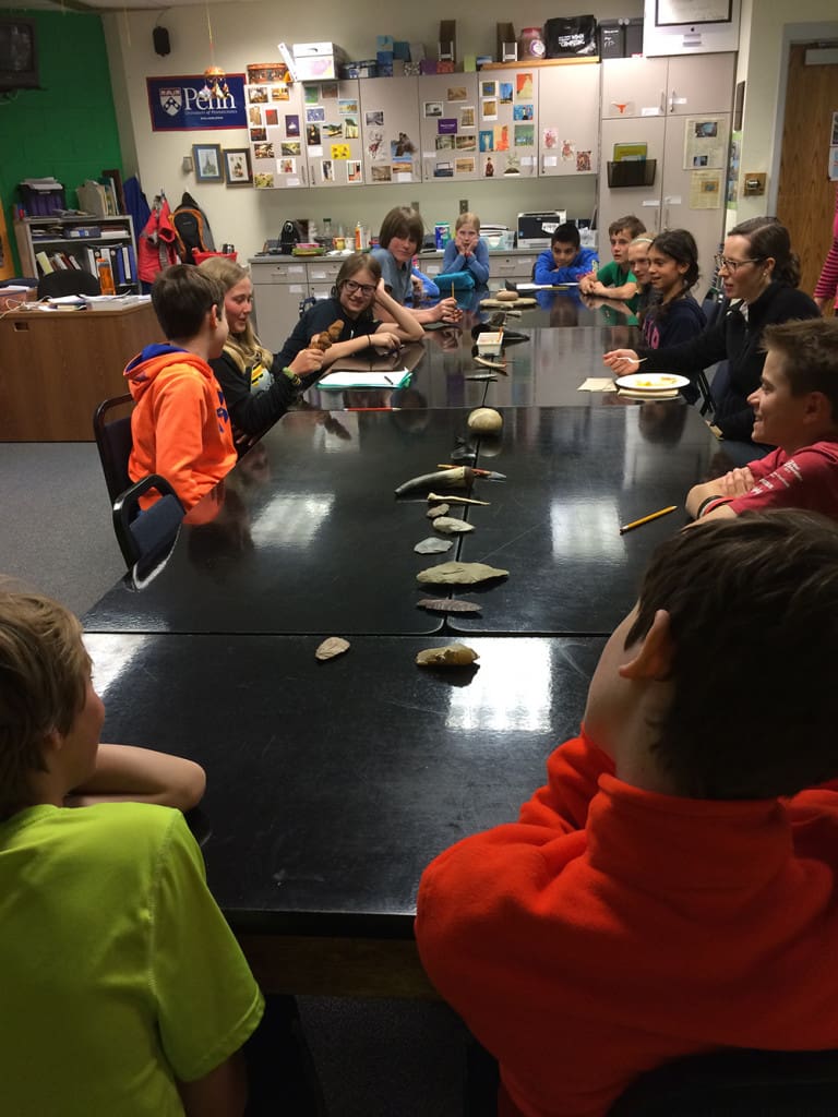Learning to 'Read the Artifacts'-reconstructing stories of the past based on artifacts and context