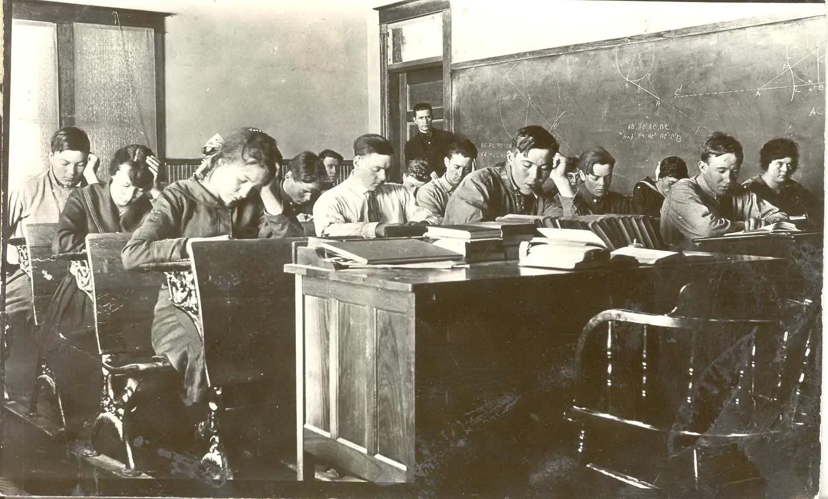 Children at desks. Museum Collection 2005.0048.005