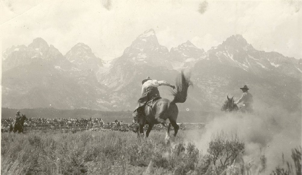 Bob Ferrin bronc riding at the old Elbo Rodeo grounds, circa1920s.