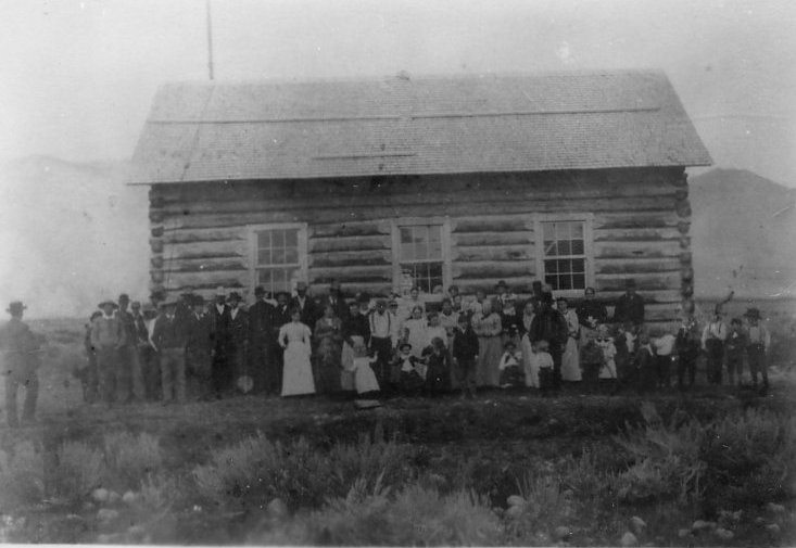 South Park residents standing in front of the newly built school.